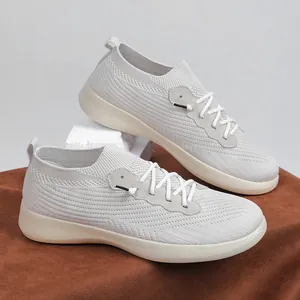 Breathable light grey flyknit running shoes for men with white laces and soft sole