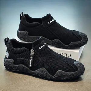 Mocasines negros transpirables para hombre con cremallera decorativa y suela con textura
