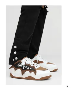 Close-up of stylish platform bread shoes with unique bat-wing design and thick sole