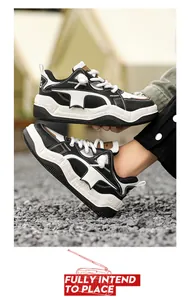 Detailed view of stylish black and white chunky bread sneakers with thick platform soles