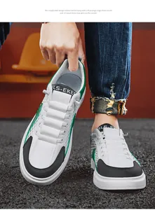 Detailansicht der atmungsaktiven Herren-Mesh-Sneaker in Weiß und Grün