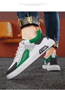 Seitenansicht der weiß-grünen, atmungsaktiven Mesh-Sneaker für Herren im urbanen Stil
