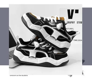 Detailed side view of black and white chunky bread sneakers with thick soles