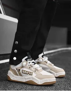 Close-up of stylish beige and white thick-soled sneakers for urban street fashion