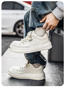 Detailed close-up view of cream leather platform sneakers for men with side quilted pattern