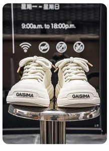 Detailed view of premium off-white leather platform sneakers with unique thick rope laces