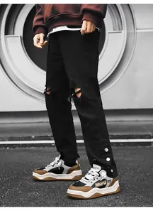 Detail view of stylish thick-soled breathable streetwear sneakers in urban setting