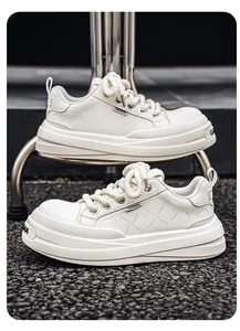 Close-up of white leather platform sneakers with quilted texture and thick sole