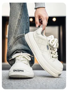 Detailed view of stylish white platform sneakers with GAISIMA logo and textured laces