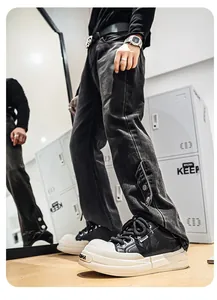 Low angle detail of men's black leather platform sneakers featuring a thick white sole