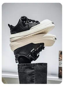 Close-up of stylish men's quilted leather platform sneakers in a black and white