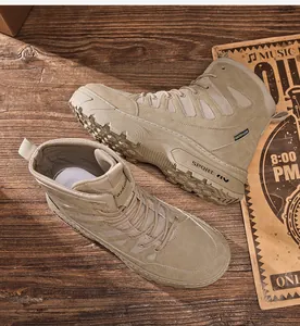Detailed macro view of sand-colored tactical military boots on rustic wooden surface