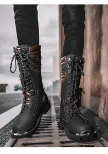 Men's rugged high-top vintage biker combat boots shown on urban metal grate background
