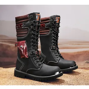 Detailed view of black and red tactical boots with metal toe and side pouch