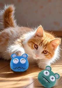 Detailed view of funny plush monster cat toys with catnip on a sunny wooden floor
