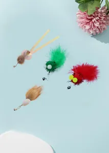 Detailed view of four colorful cat teaser wand replacement heads with feathers and bells
