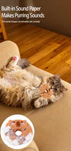Detail view of doughnut cat plush toy showing internal crinkle paper feature
