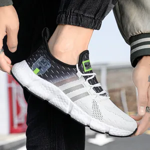 Men's lightweight fly-knit running sneakers with cushioned popcorn sole in grey gradient.