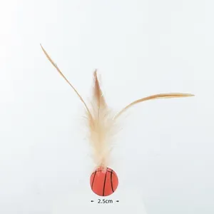 Close-up of 2.5cm cat toy bouncy ball with natural feathers for interactive play