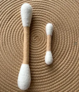 Detailed view of two sizes of wool felt giant cotton swab cat toys for teeth cleaning