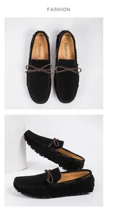 Detailansicht schwarzer Wildleder-Loafer mit dekorativer brauner Lederschleife