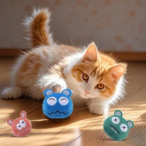 Funny monster plush cat toy set with catnip and interactive ginger cat playing indoors.