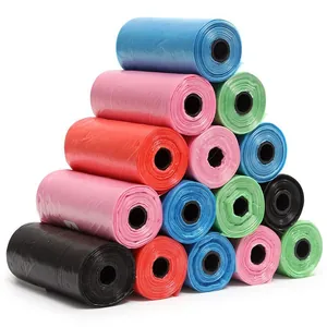 Pyramid stack of colorful rolls of pet waste bags in blue pink green orange and black