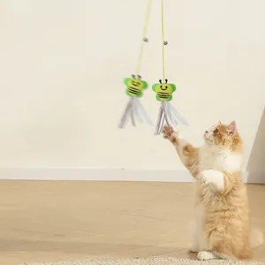 Interactive hanging bee cat toy with elastic string and tassels for indoor exercise