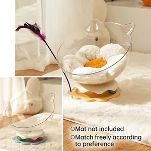 Transparent space capsule cat bed with integrated toy turntable and feather wand