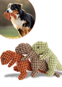Detailed macro view of colorful plush dinosaur dog toys featuring a Bernese Mountain Dog