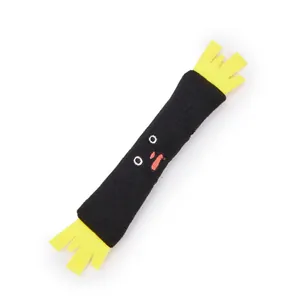 Detail showing plush black catnip toy with yellow felt ends and embroidered face