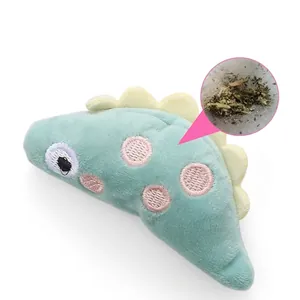 Simpatico dinosauro in peluche verde per gatti con erba gatta incorporata per rilassamento