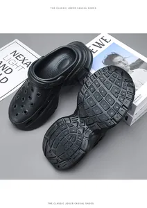 Detail view of black summer clogs showing thick anti-slip sole and breathable holes