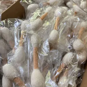 Bulk pure wool cat toys shaped like giant cotton swabs in individual plastic packaging.