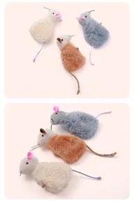 Detailed view of three colorful plush mouse cat toys on a pink background