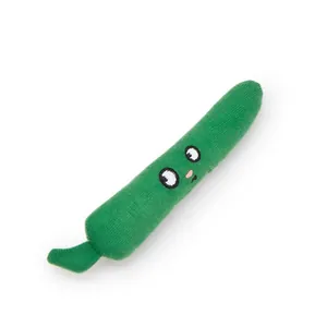 Detailed view of the green knit catnip toy featuring a cute embroidered cartoon face