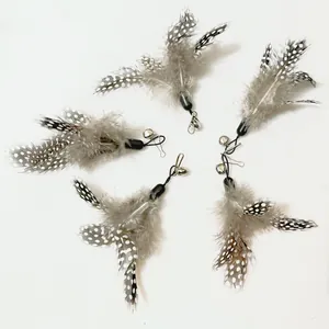 Detailed view of spotted feather cat wand replacement heads with bells and hooks