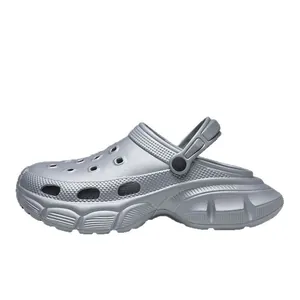 Silver platform clogs with chunky sole and adjustable strap for summer beach wear
