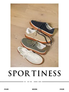 Variety of stylish suede sports board shoes in different colors on wood floor.