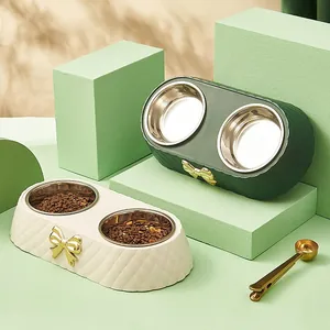 Modern bowknot pet double bowls in green and cream with removable stainless steel inserts