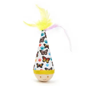 Detailed view of an interactive tumbler cat toy with colorful feathers and butterfly patterns.