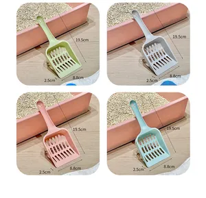 Detail view of plastic cat litter scoop with hollow grid showing dimensions 19.5cm by 8.8cm