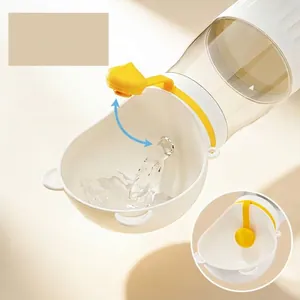 Portable leak-proof dog water bottle and feeder for pet travel, white and yellow.