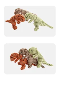 Detailed view of three corduroy plush dinosaur dog toys in orange, brown, and green