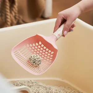 Grote roze kattenbakschep met hartjesgaten voor efficiënte reiniging van huisdierafval