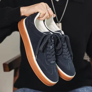 Premium navy blue suede men's sneakers with brown gum sole for stylish casual daily wear