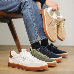 Stylish men's suede casual sneakers with breathable gum soles available in multiple colors.