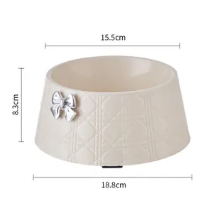 Grand bol pour animaux crème avec nœud argenté et dimensions de 15,5 cm et 18,8 cm