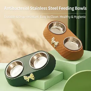 Light luxury bow-tie pet double bowl with stainless steel inserts for food and water