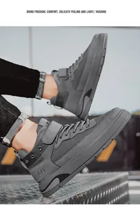 Dettaglio di sneaker grigie alte con chiusure in velcro e trame in mesh tecnico